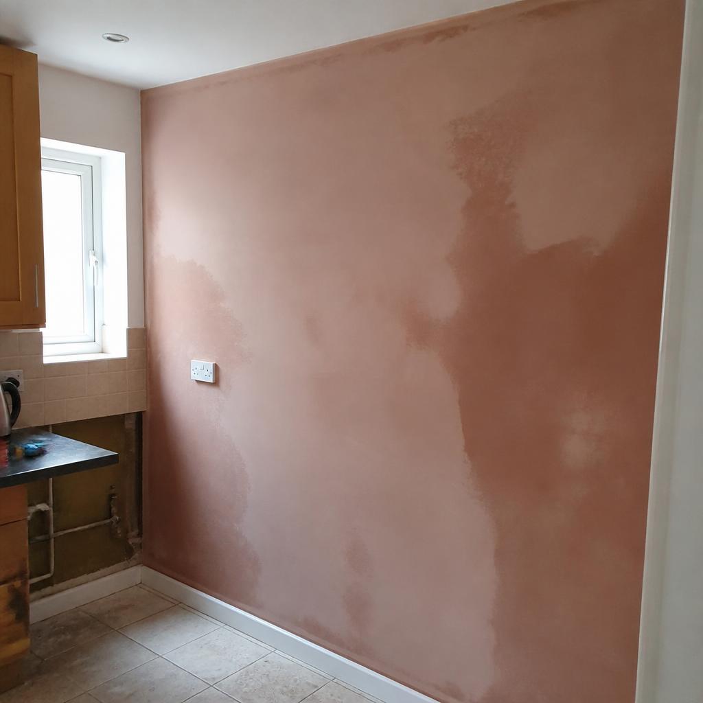 Kitchen wall freshly skimmed and partially dried