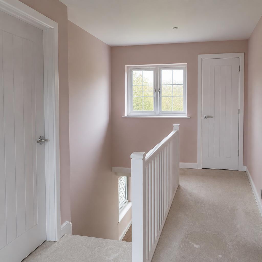 Newly plastered landing area at the top of stairs