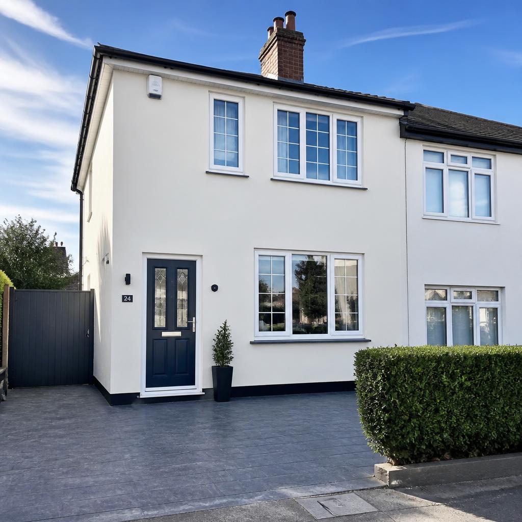 Cream silicone render finish on a UK semi-detached house
